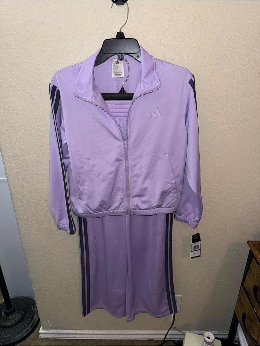 Girl’s Adidas purple tracksuit set
